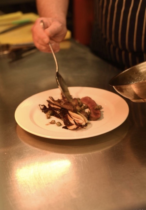 Chef plating a dish at The Punch Bowl Paglesham